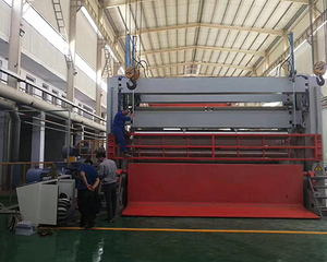 Bottom feeding rewinder